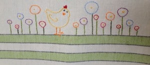 chick-w-flowers-embroidery-sample