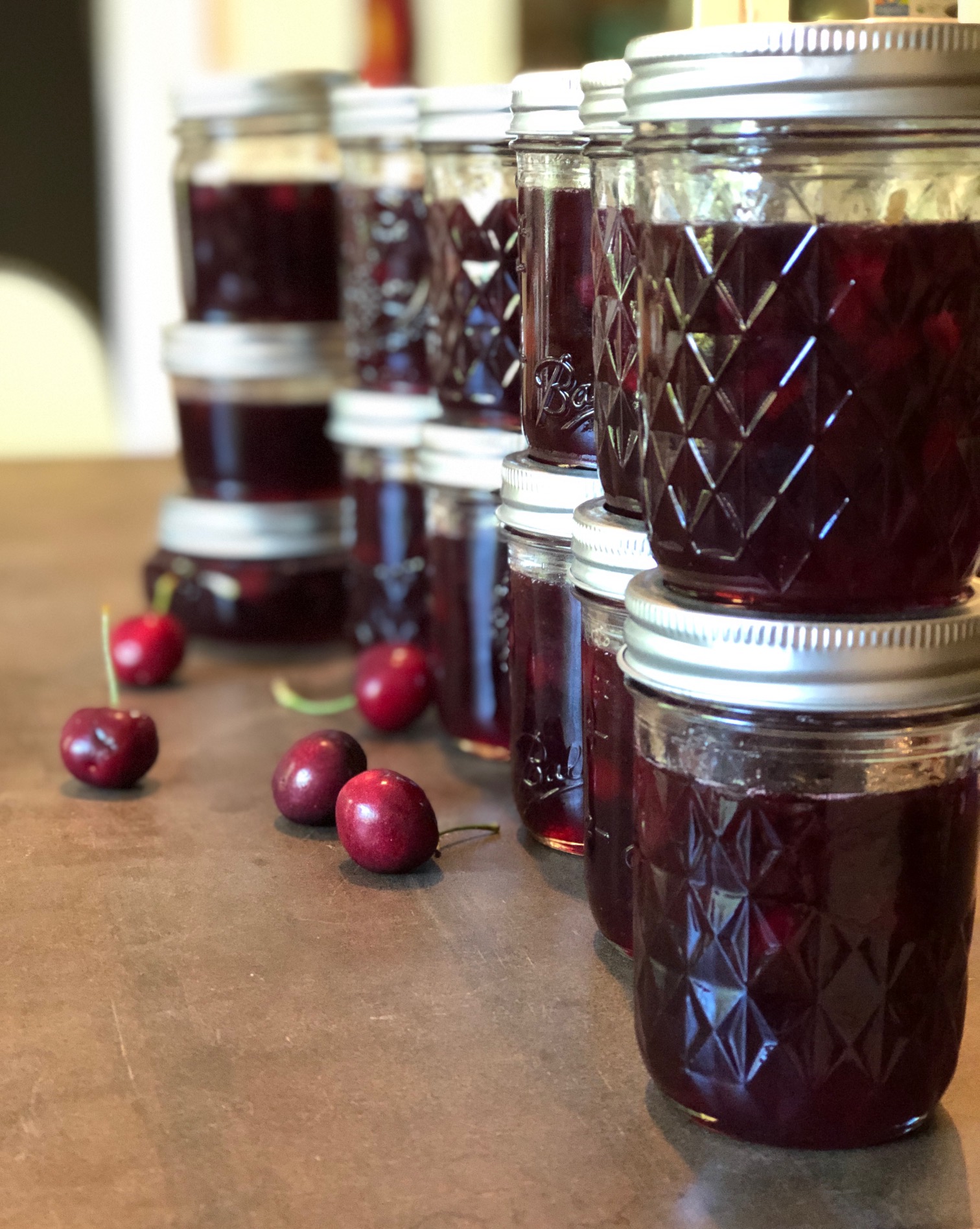 Jars of freshly canned cherry marmalade