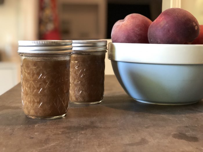 Have you wanted to try making fruit butter but thought it seemed too hard or didn't want to deal with all that peeling? You're in luck. This simple no-peel fresh peach butter is easy to make and tasty! And the best part? You don't have to PEEL anything! I made mine with honey to sweeten and cinnamon and ginger to spice it up, but you can personalize it completely to your own tastes.