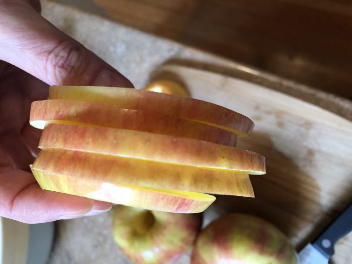 With fall comes an abundance of apples which is a perfect excuse to make dehydrated spiced apples. These apple chips are great plain, but I'm also going to show you how to spice them up a bit (using dried spices or essential oils) to make them even better! Dehydrated spiced apples are one of nature's perfect (healthy) candies. And they're addictive...but they're also easy to make so eat away!