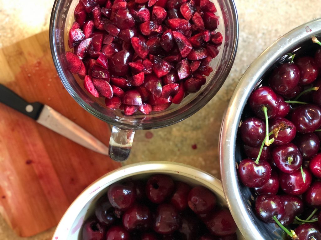 pitting and chopping fresh cherries