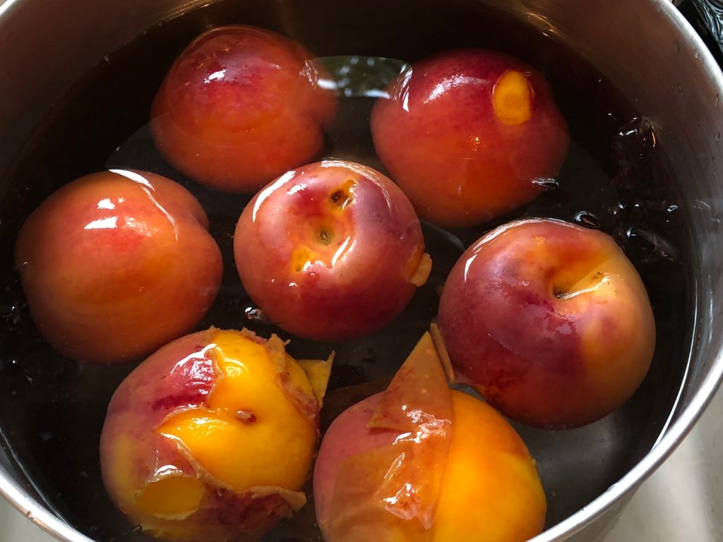 nectarines in ice bath for blanching